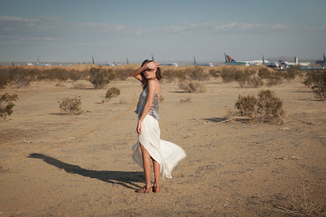 Saia branca - white skirt £36vestido prata - silver camisole £22 Sandalia - sandals £24